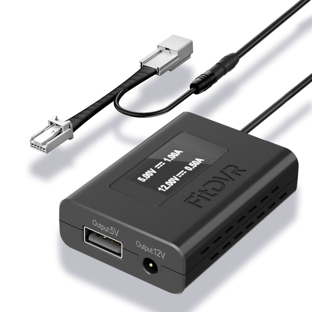 FitDVR Black electronic power adapter with cables on a white background