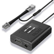 Black electronic power adapter with connectors on a white background