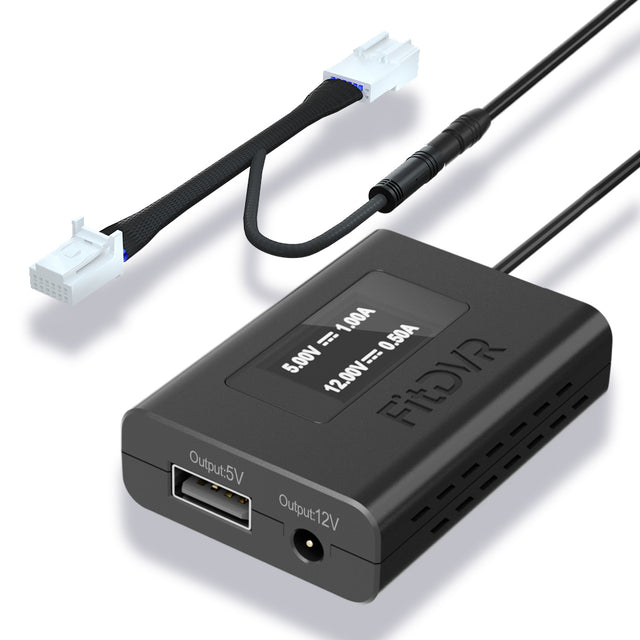 Black electronic FitDVR power adapter with cables on a white background