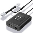 Black electronic power adapter with cables on a white background