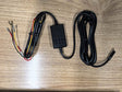 Car dashcam hardwiring harness with connectors on a wooden surface
