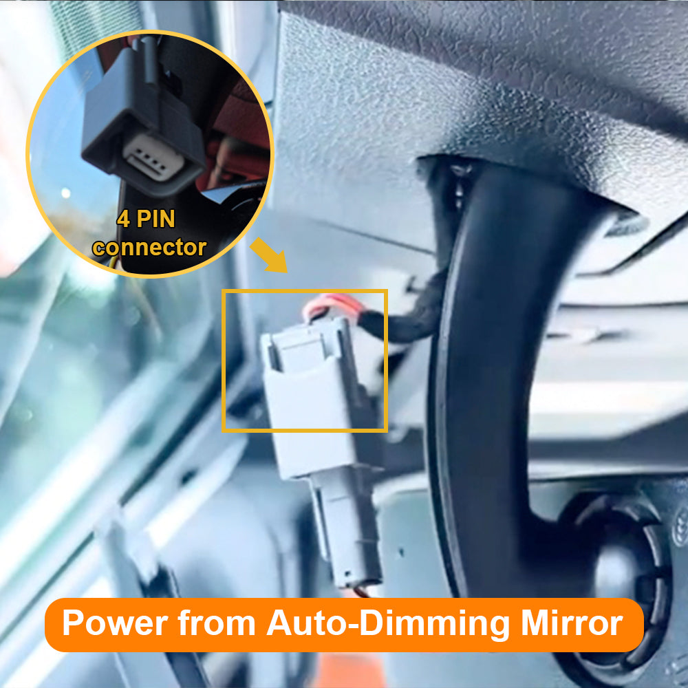Close-up of a car's interior with a focus on a 4-pin connector and power supply from an auto-dimming mirror.